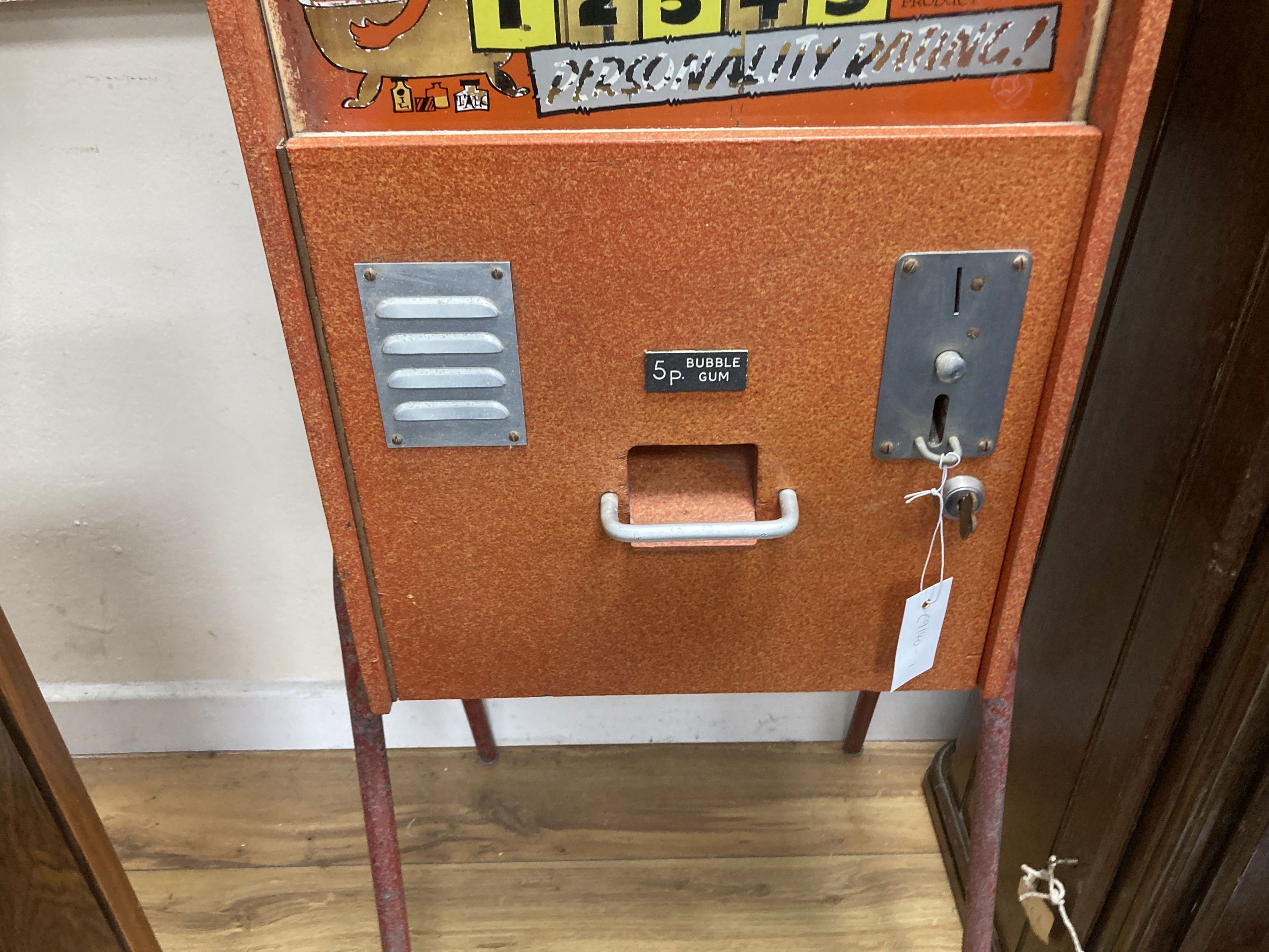 A novelty 20th century gum drop musical personality test arcade machine, width 38cm, depth 28cm, height 137cm